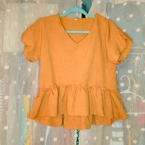 Burnt orange ruffle top Size L